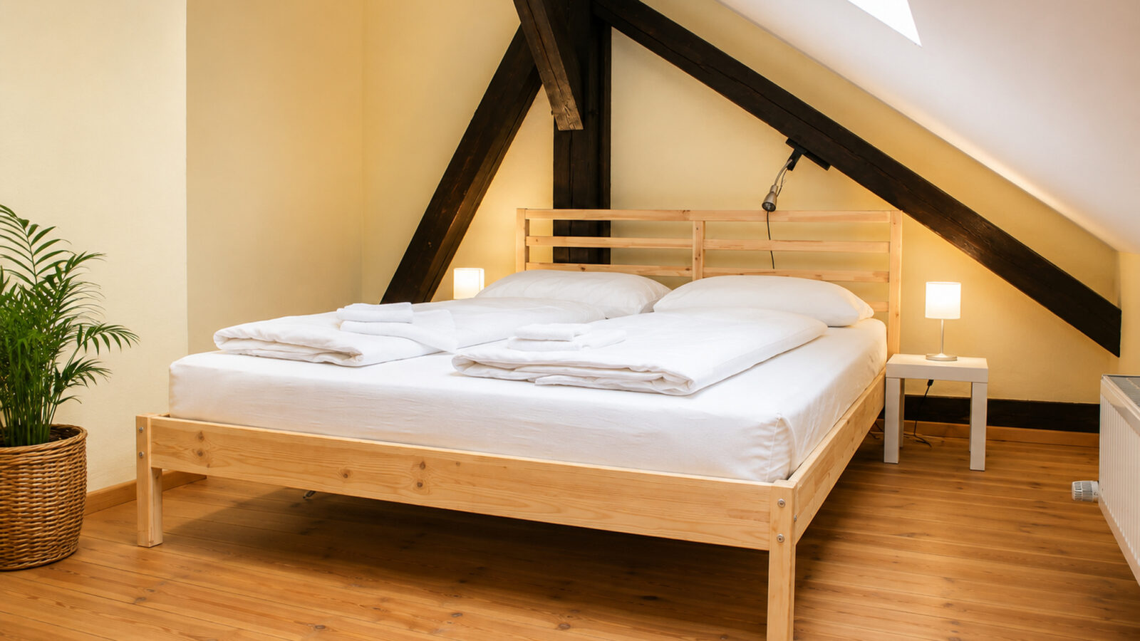 SEEZEIT Zinnmanufaktur – Zweites Schlafzimmer unter dem Dach SEEZEIT Ferienwohnung an der Zinnmanufaktur: Zweites Schlafzimmer unter dem Dach